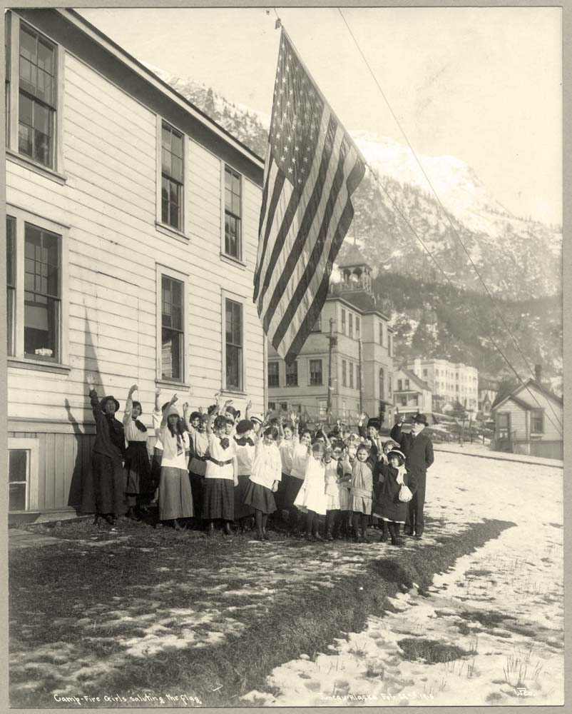 Juneau. Camp-Fire Girls saluting the flag, 1915