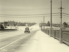 Seattle. Car headed northbound at north end of Aurora Bridge, 1932