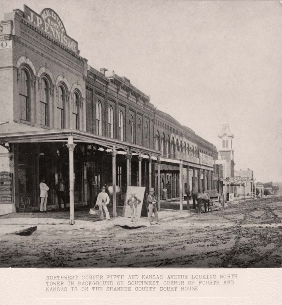 Topeka, Kansas. Corner of Fifth and Kansas Avenue, Tower in the background is the Shawnee County Courthouse, circa 1875