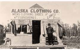Anchorage. Man in front of Anchorage Clothing Store