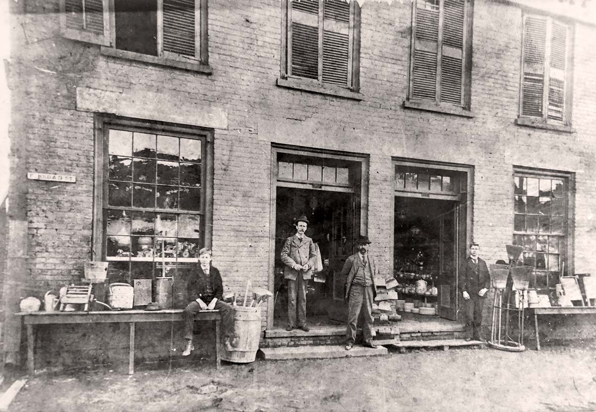 Athens, Georgia. Father and his sons in front of their store, 1889