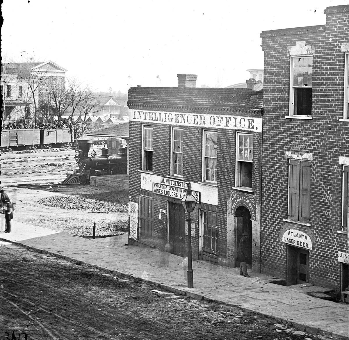 Atlanta, Georgia. Intelligencer newspaper office by the railroad depot, 1864