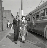 Baltimore. Trolleybus, women's go away with work, April 1943