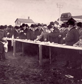 Bismarck. President Roosevelt satisfying a ranchman's appetite at a barbeque, 1903