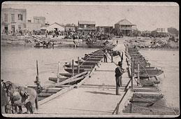 Brownsville. View of Levee Street from the pontoon bridge across the Rio Grande River, 1866