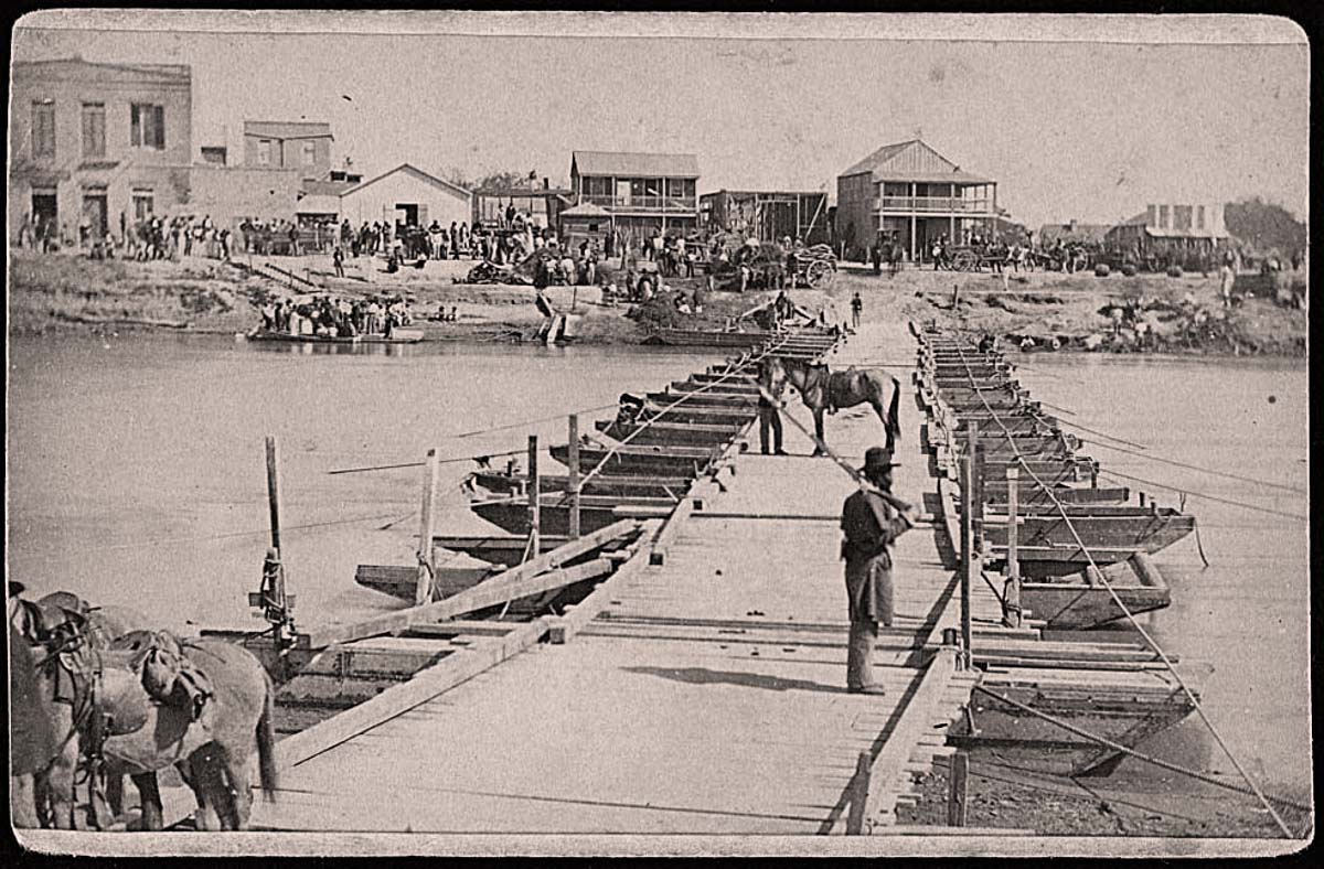 Brownsville, Texas. View of Levee Street from the pontoon bridge across the Rio Grande River, 1866