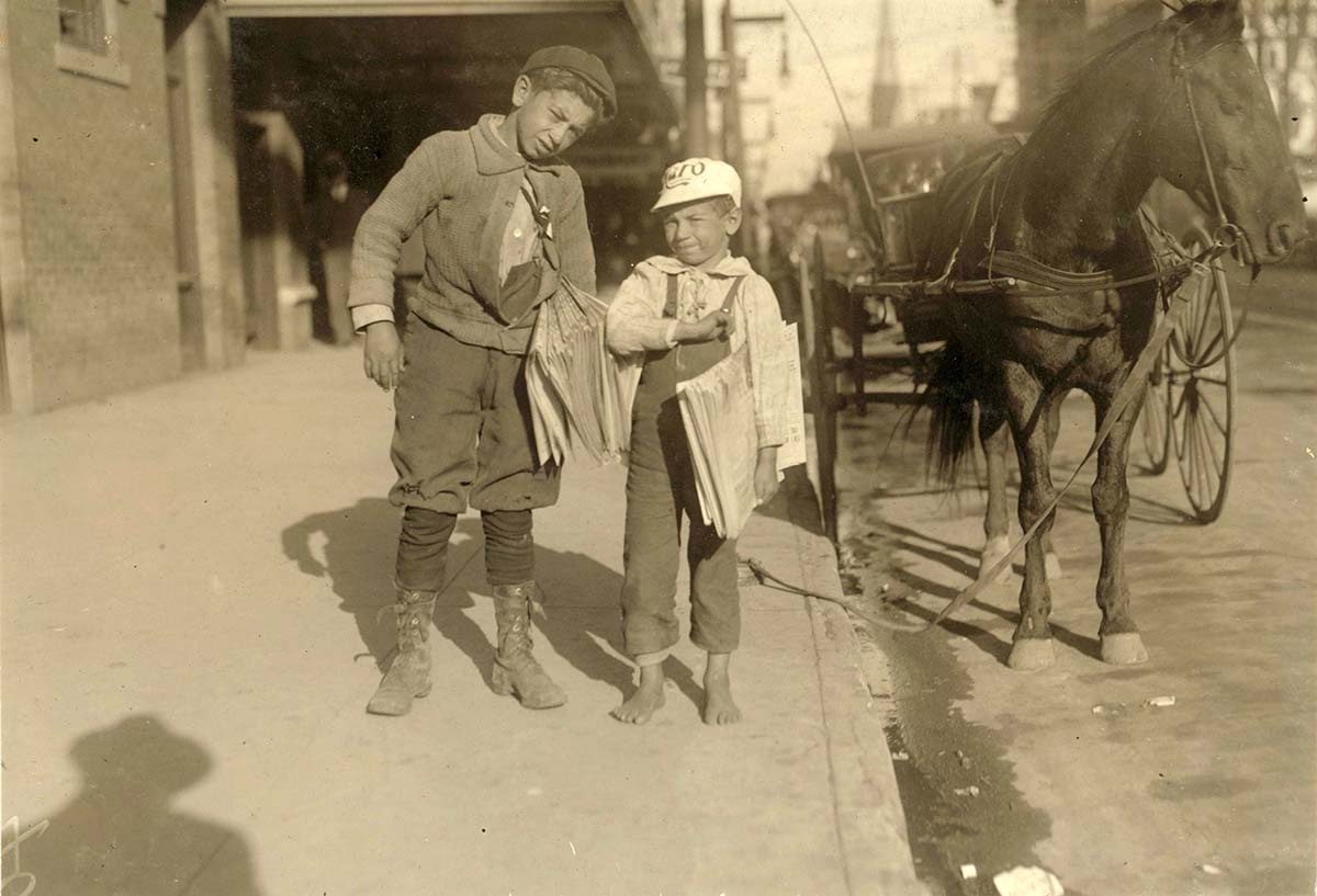 Dallas, Texas. Six-year old boy, Louis Shuman, and his 11 year old brother, newsboys, 1913