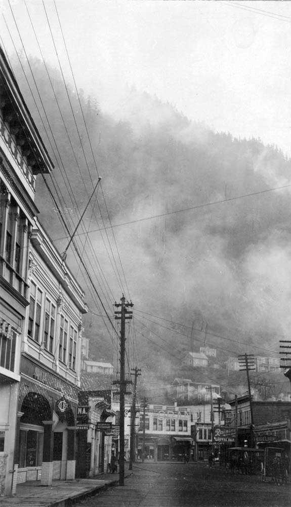 Juneau. Clouds descending into the main street, between 1890 and 1930