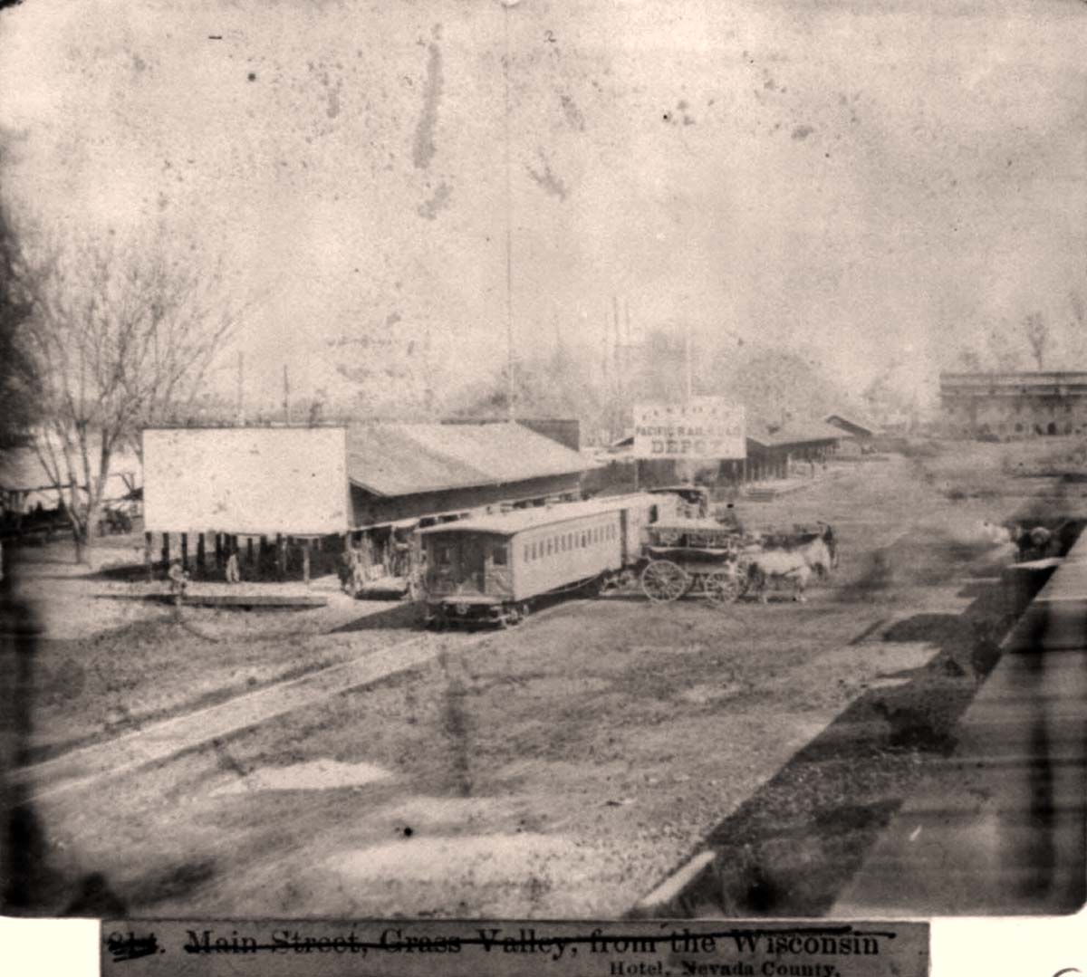 Sacramento, California. Railroad depots on the levee, 1866