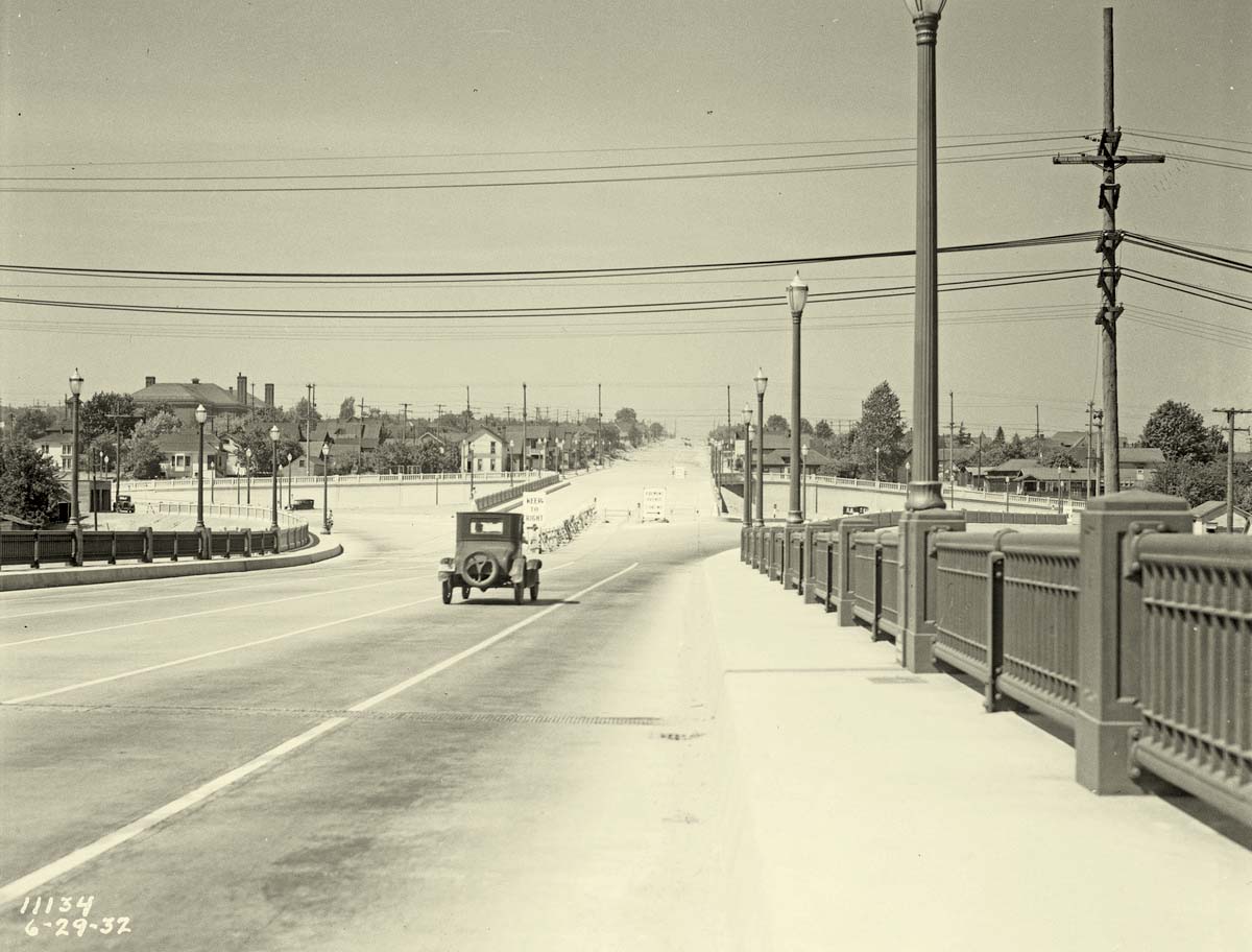 Seattle, Washington. Car headed northbound at north end of Aurora Bridge, 1932
