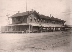 Atchison, Topeka and Santa Fe Railroad Co depot at Fourth and Holliday streets, completed in 1869